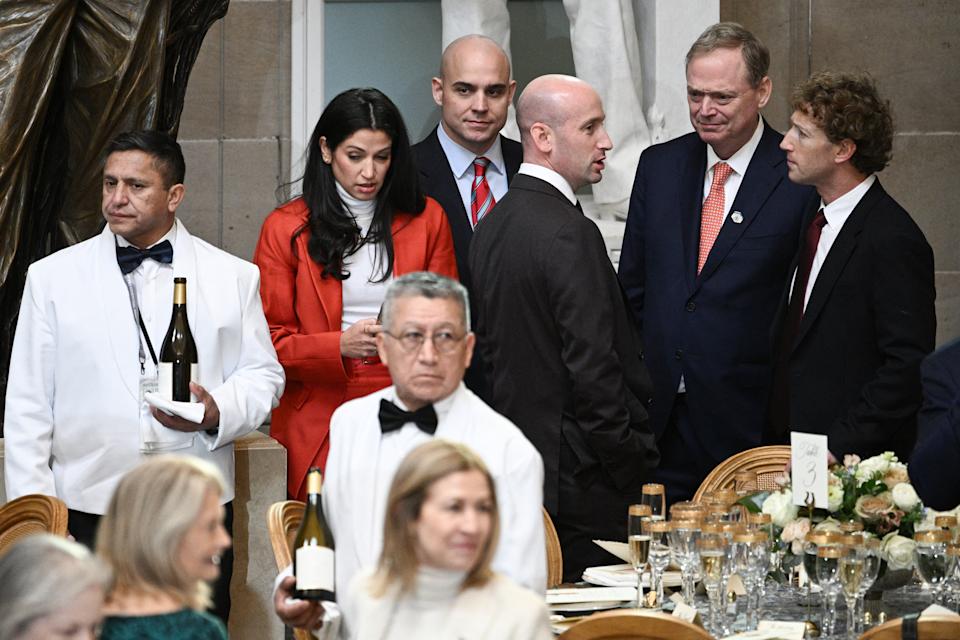 White House Deputy Chief of Staff for Policy Stephen Miller (3rd R) speaks with CEO of Meta and Facebook Mark Zuckerberg (R) during a luncheon in honor of newly sworn in US President Donald Trump, in Statuary Hall at the US Capitol in Washington, DC, on January 20, 2025. (Photo by Brendan SMIALOWSKI / AFP) (Photo by BRENDAN SMIALOWSKI/AFP via Getty Images)