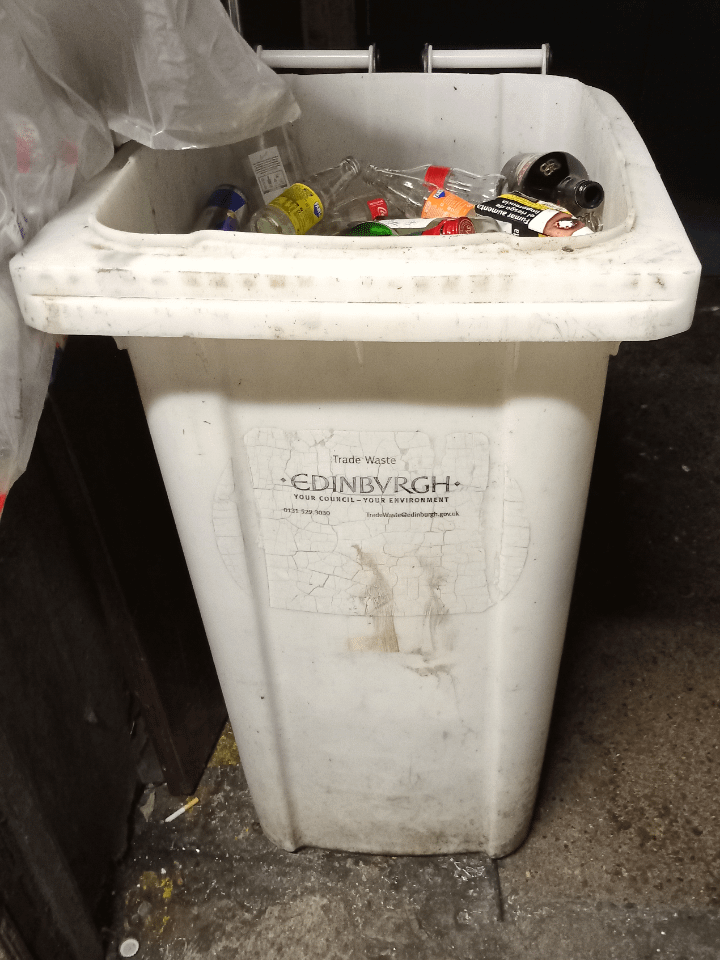 I wonder what journey this wheel bin took to end up as a glass bin at a pub in South East Ireland