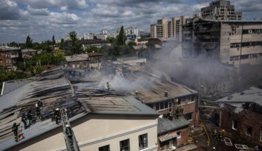Firefighters responding to a fire on a rooftop after a Russian strike in Kharkiv, Ukraine, July 24, 2025. (David Guttenfelder/The New York Times)