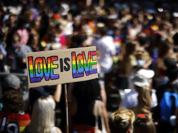 People demonstrate at the Zurich Pride parade in Zurich, Switzerland, with the slogan "Dare. Marriage for all, now!" (Trau Dich. Ehe fuer alle. Jetzt!) for the rights of the LGBTIQ community ...