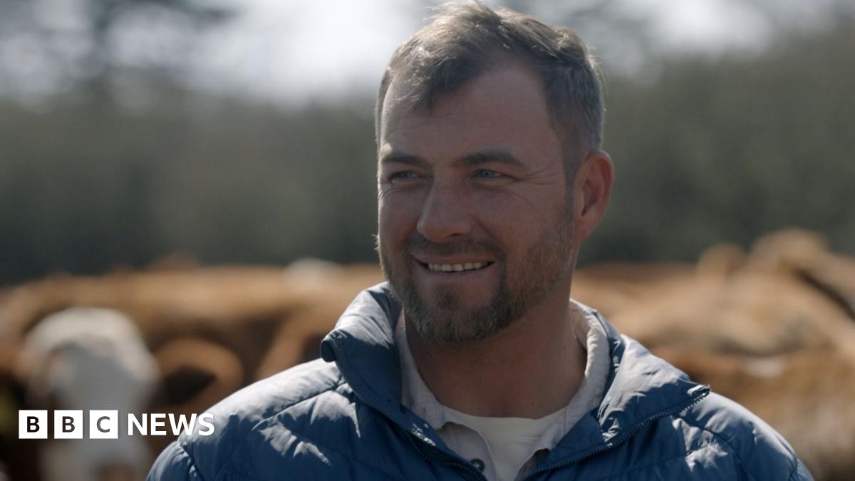A head and shoulders image of farmer Marthinus. He is wearing a blue puffer jacket and a blue shirt and white vest can be seen underneath it.