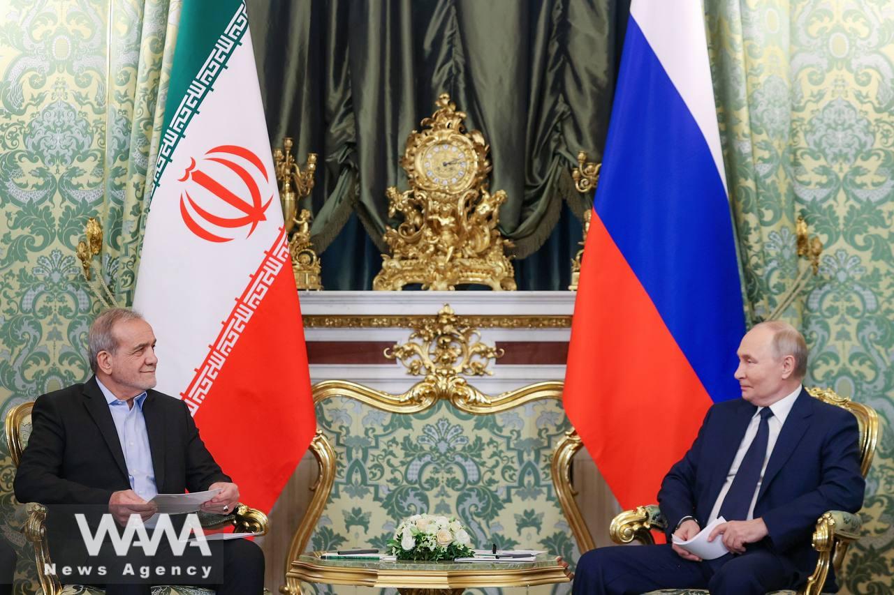 Russian President Vladimir Putin and Iranian President Masoud Pezeshkian meet in Moscow, Russia January 17, 2025. Handout / WANA News Agency