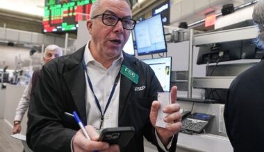 Wall Street ticks toward the edge of its all-time high :: WRAL.com