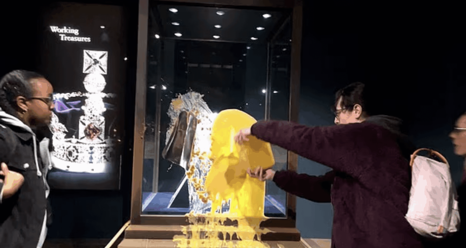 Activists throw apple crumble at Crown Jewels at Tower of London