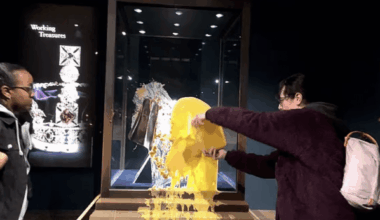 Activists throw apple crumble at Crown Jewels at Tower of London