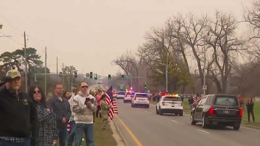 Iowans mourn along procession route honoring fallen Iowa National Guard soldiers