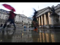Bank of England cuts rates by one vote | Business