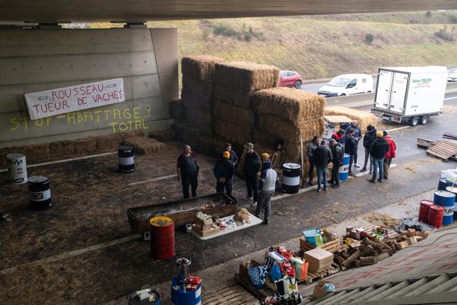 Farmers block the RN88 motorway, near the Marengo interchange, in Baraqueville, southern France, on December 17, 2025.