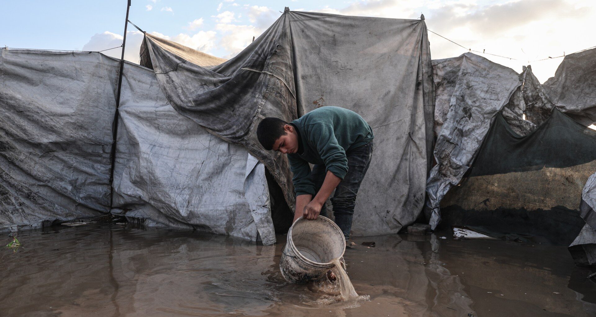 Palestinians suffer flooded tents and debris as cold and rain lash Gaza | Israel-Palestine conflict News