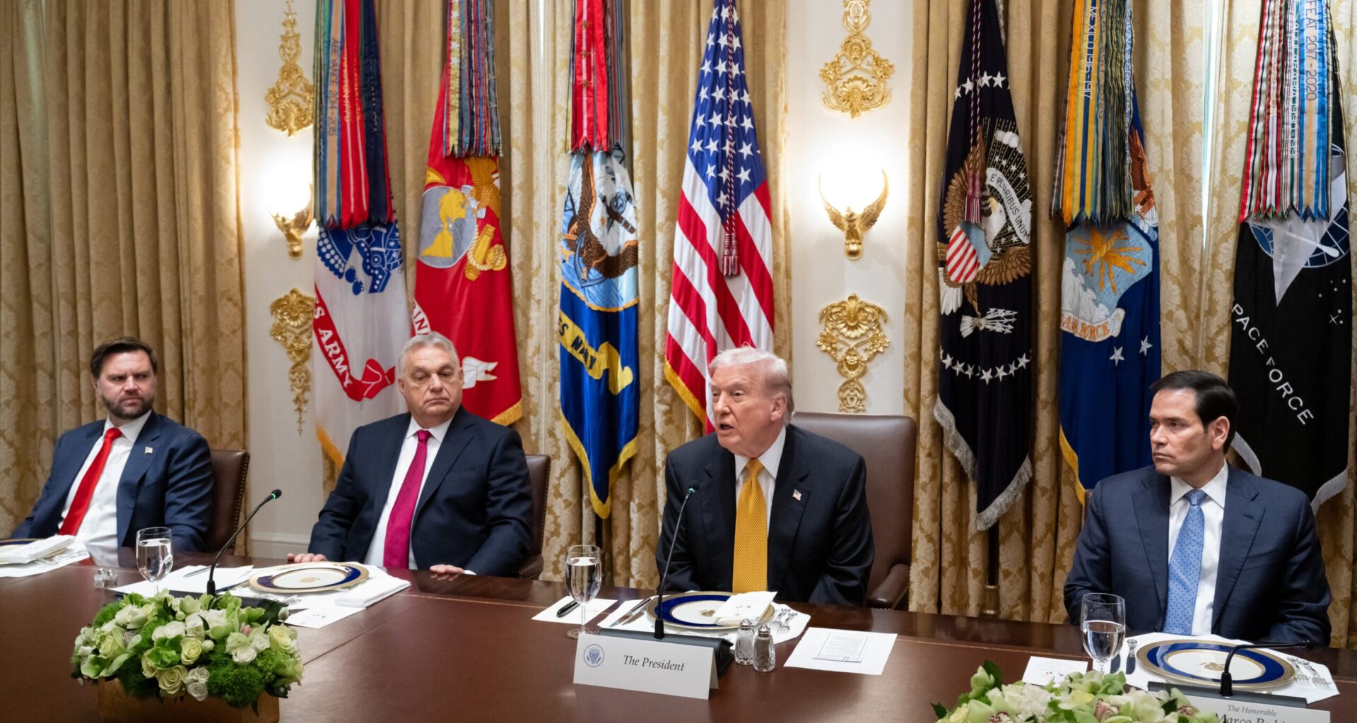 S President Donald Trump, alongside Secretary of State Marco Rubio (R) and Vice President JD Vance (L), speaks during a meeting with Hungarian Prime Minister Viktor Orban (2L) in the Cabinet Room of the White House in Washington, DC on November 7, 2025.