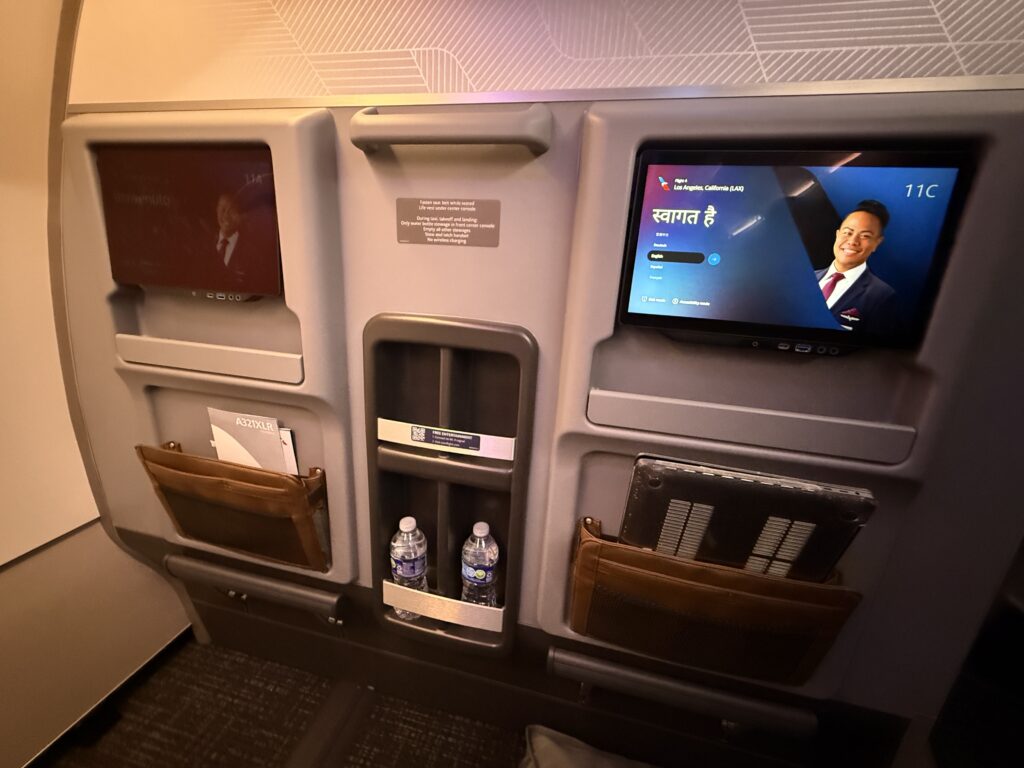 Seatbacks of seat duo in Premium Economy