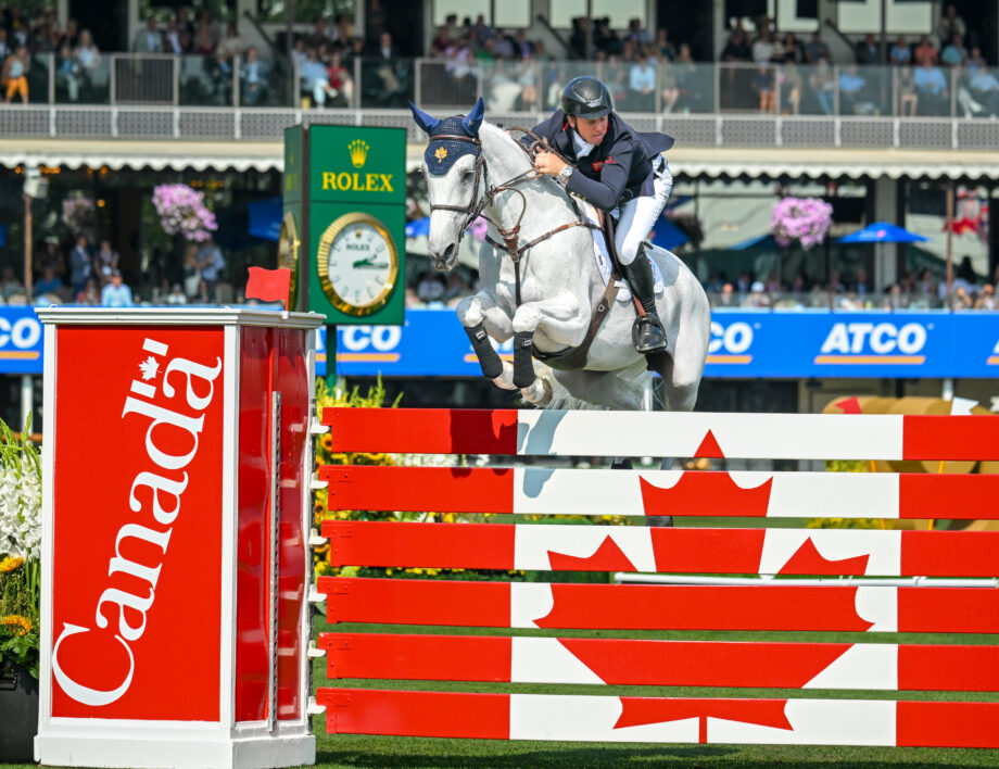 Matt Sampson and Ebolensky jumping for Great Britain in the BMO Nations Cup showjumping competition at Spruce Meadows, Canada.