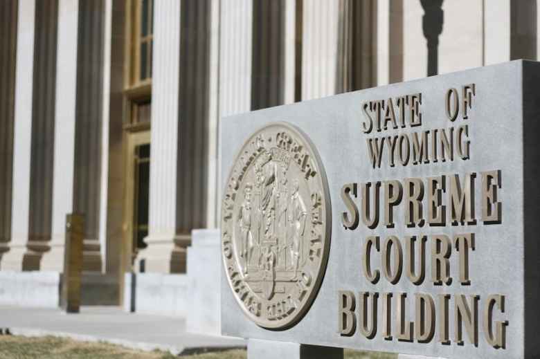 A sign that says State of Wyoming Supreme Court Building