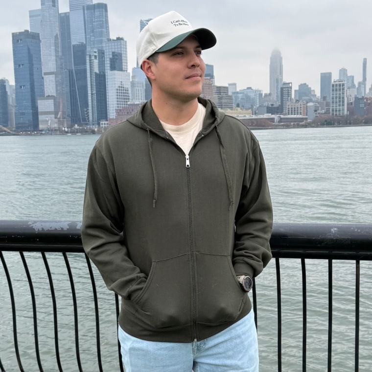 Commerce editor and producer Julie Ricevuto's husband, Gavin Smith, wears the Fruit of the Loom Eversoft Fleece Sweatshirt.