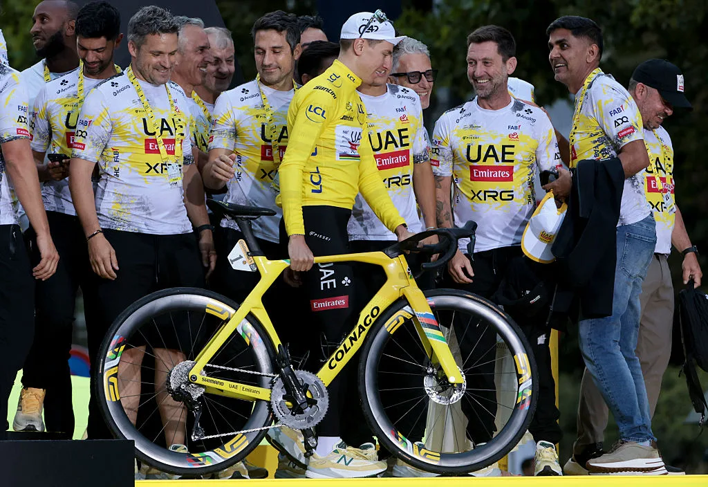 PARIS, CHAMPS-ELYSEES, FRANCE - JULY 27: Tadej Pogacar of Slovenia and UAE Team Emirates - XRG wins the race leader's yellow jersey during the final podium ceremony following Stage 21 of the 112th Tour de France 2025, a 132,3 km stage from Mantes-la-Ville to Paris, Champs-Elysees on July 27, 2025 in Paris, France. (Photo by Jean Catuffe/Getty Images)