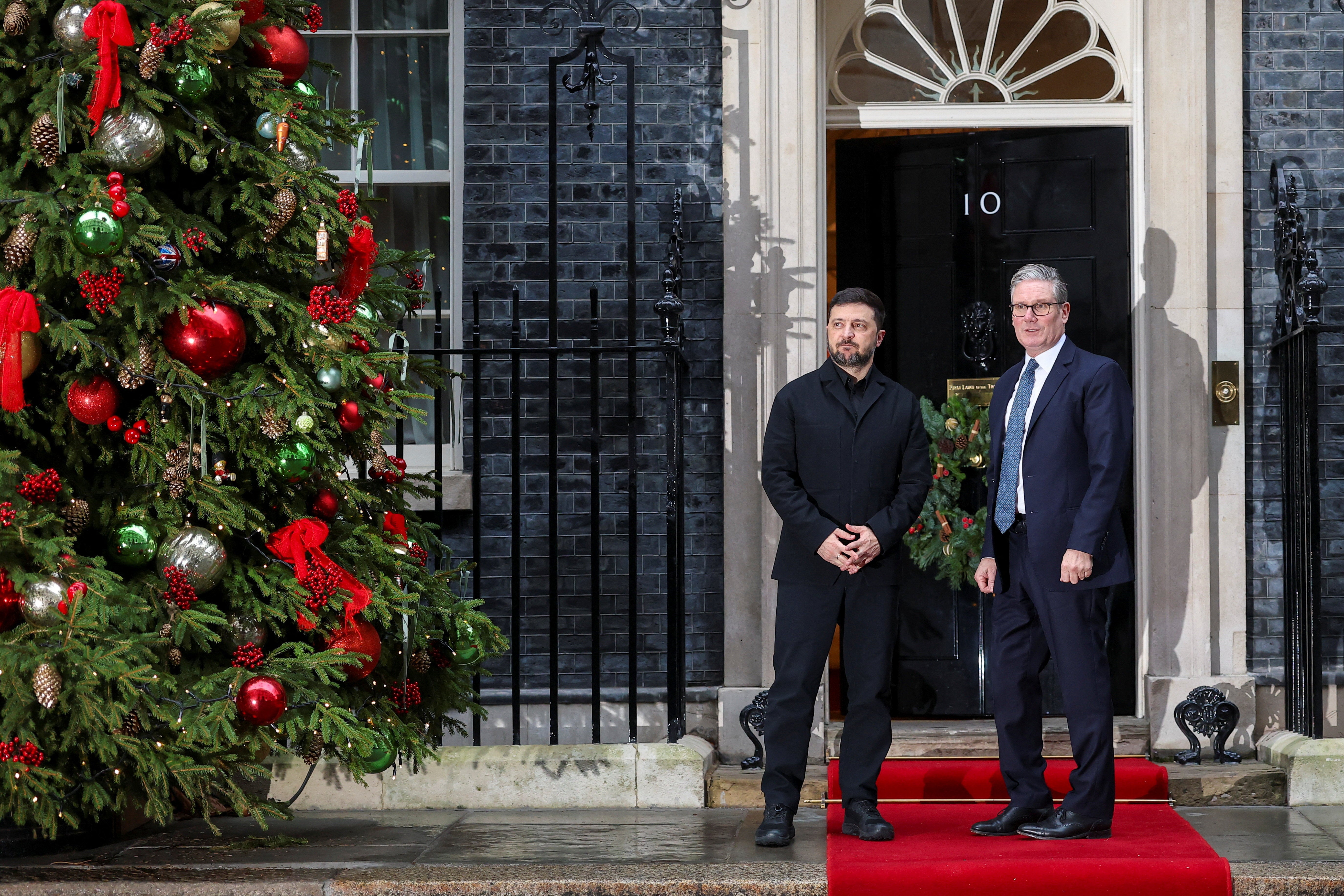 British prime minister Keir Starmer stands with Ukrainian President Volodymyr Zelenskyy after a meeting at 10 Downing Street on 8 December 2025 in London, England