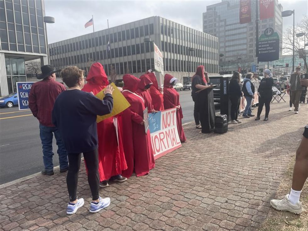 A group protested dozens of ICE arrests at a Kansas City immigration court hearing.