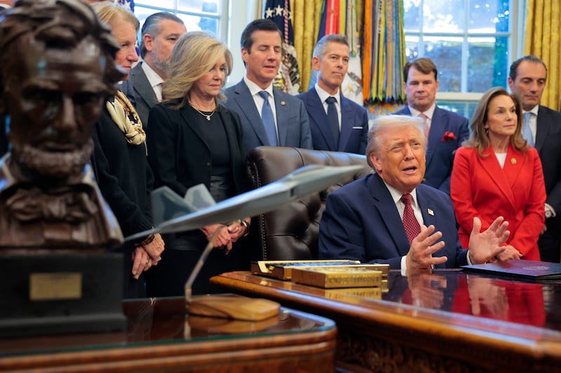 U.S. President Donald Trump  makes an announcement on changes to the country's fuel economy standards in the Oval Office at the White House on December 03, 2025 in Washington, DC.