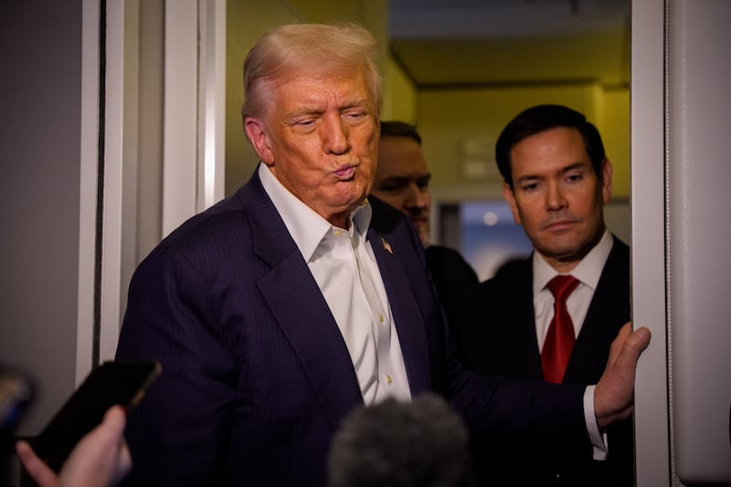 U.S. President Donald Trump, accompanied by U.S. Secretary of State Marco Rubio