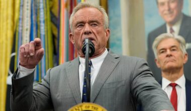 Health and Human Services Secretary Robert F. Kennedy Jr. speaks as Centers for Medicare & Medicaid Services administrator Dr. Mehmet Oz listens during an event with President Donald Trump in the Oval Office of the White House, Friday, Oct. 10, 2025, in Washington.