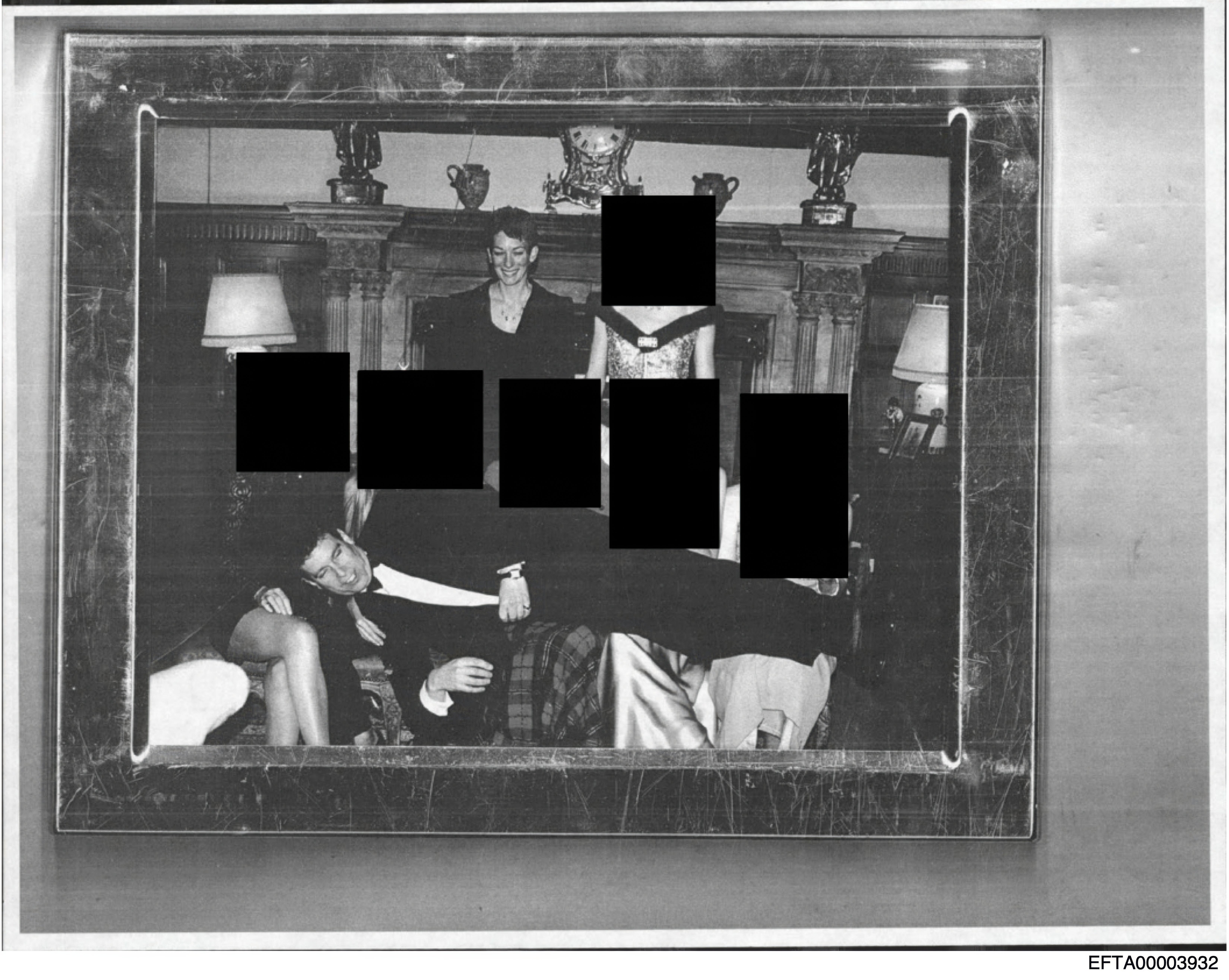 The then Prince Andrew pictured reclining across the laps of several people in a photograph kept by Epstein