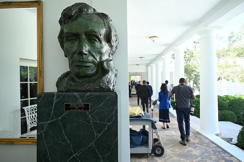 View of a newly-installed bust of former president Abraham Lincoln in the West Wing colonnade at the White House in Washington, DC, on September 2, 2025. From a gold-plated White House to a grandiose revamp for the capital Washington, Donald Trump is trying to leave an architectural mark like no American president has attempted for decades. (Photo by SAUL LOEB / AFP) (Photo by SAUL LOEB/AFP via Getty Images)