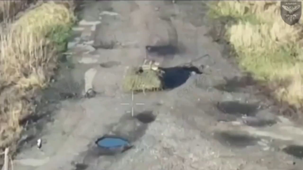 Drone footage of a Russian "Courier" UGV transporting ammunition getting hit by a Ukrainian FPV quad. Sumy Oblast.