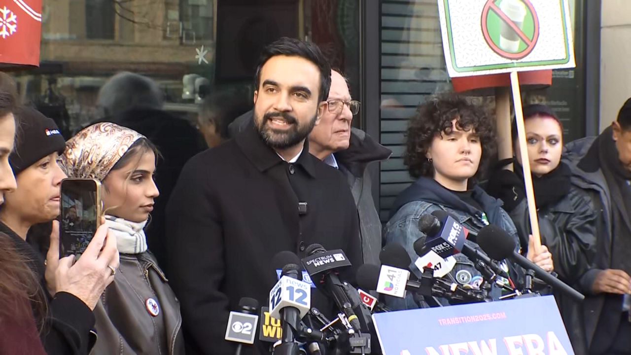 Mayor-elect Zohran Mamdani and Vermont U.S. Sen. Bernie Sanders joined protesters outside a Park Slope Starbucks alleging unfair labor standards. (Spectrum News NY1)
