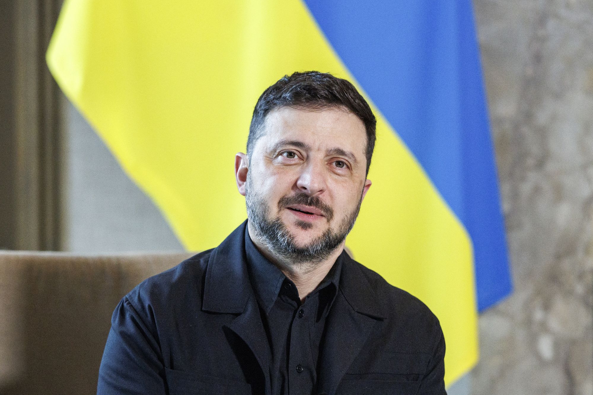 Ukrainian president Volodymyr Zelensky reacts ahead of a delegation lunch at the Catshuis in The Hague on 16 December 2025