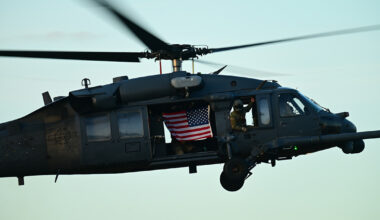 A photo of a CalGuard helicopter with an American flag.