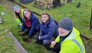 Refugees join biodiversity effort at Gwynedd churchyard