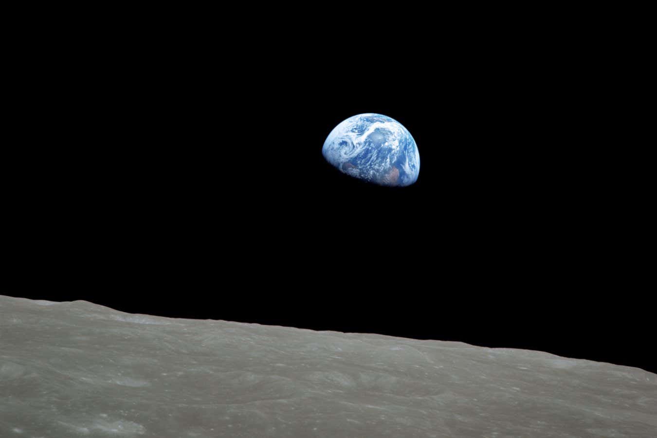 View of Earth rising over the lunar horizon, taken on December 24, 1968, by Apollo 8 astronaut William Anders. This photo was used on the cover of the Analysis of Apollo 8 Photography and Visual Observations (NASA SP-201), published 1969.