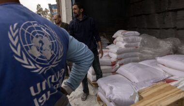 Sacks of flour are distributed in Gaza City from a center run by the United Nations Relief and Works Agency — widely known as UNRWA — on April 1, 2025. Israel’s Parliament passed new legislation on Monday, Dec. 29, 2025, formally removing diplomatic immunity from the agency. (Saher Alghorra/The New York Times)