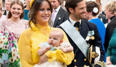 Princess Sofia carries her daughter, Princess Ines, through the royal chapel at the baby