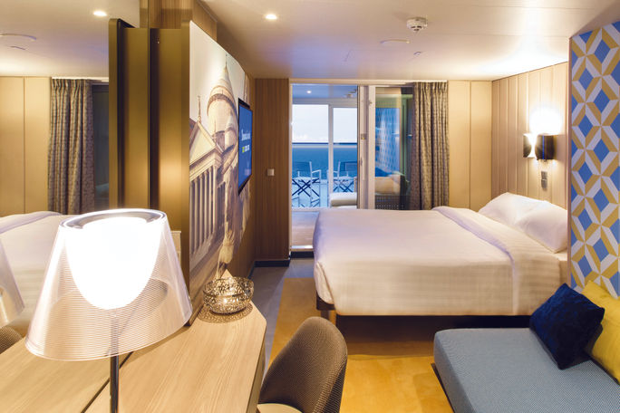 Staterooms aboard Costa Smeralda reflect iconic Italian design and locations.
