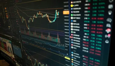 Japan's Nikkei rises as Topix climbs to record high, Wall Street futures muted