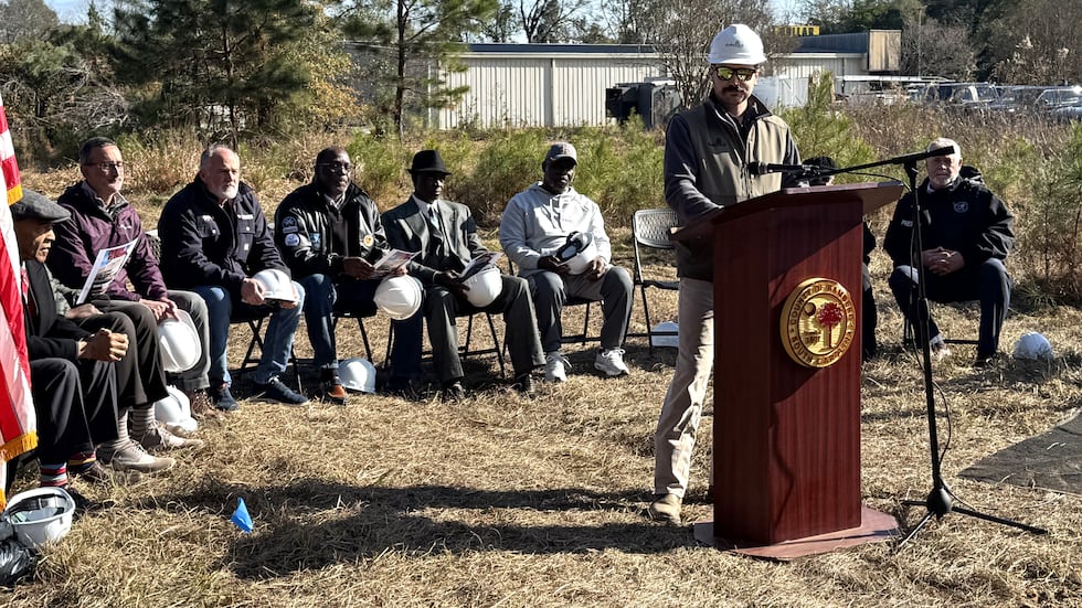 Officials and residents celebrate the groundbreaking for a new Tractor Supply store in...