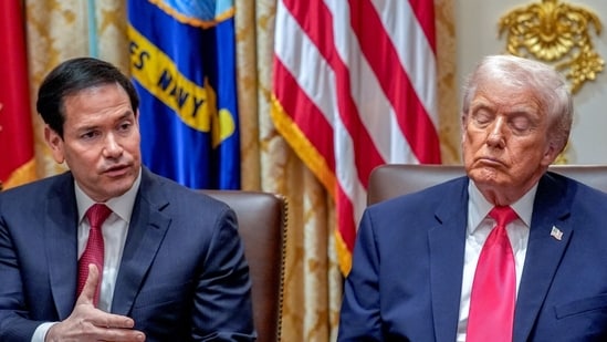 Marco Rubio, US secretary of state, with US President Donald Trump during a cabinet meeting at the White House in Washington, DC.(Bloomberg File)
