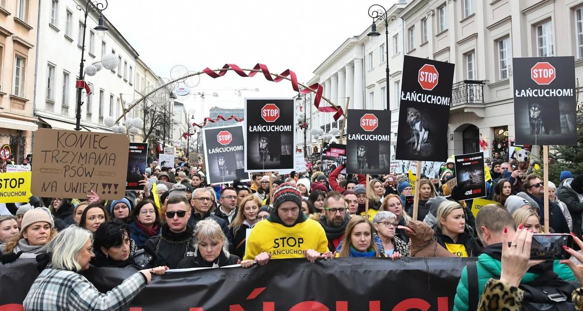 Thousands march in protest against Polish president’s veto of dog-chaining ban