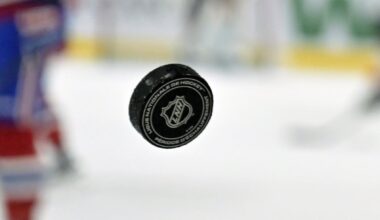 NHL puck with logo; World Junior Championship Predictions