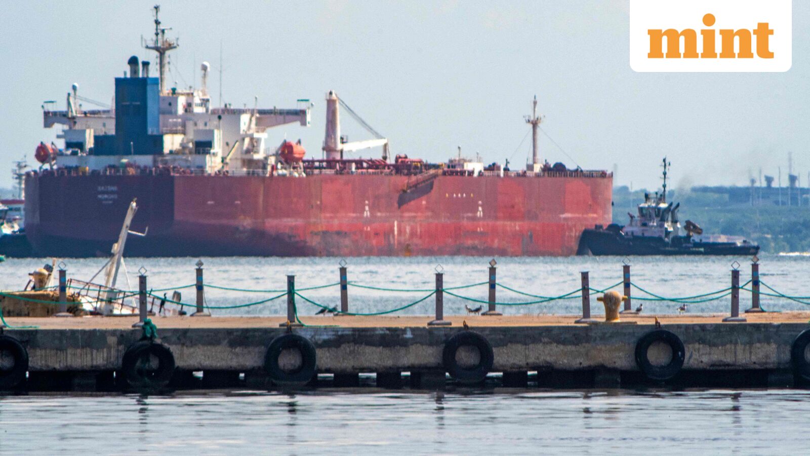 A crude oil tanker is anchored on Lake Maracaibo near Maracaibo, Zulia state, Venezuela, on December 18, 2025. Venezuela struck a defiant note on December 17, insisting that its crude oil exports were not impacted by US President Donald Trump's announcement of a potentially crippling blockade. (Photo by Alejandro Paredes / AFP)