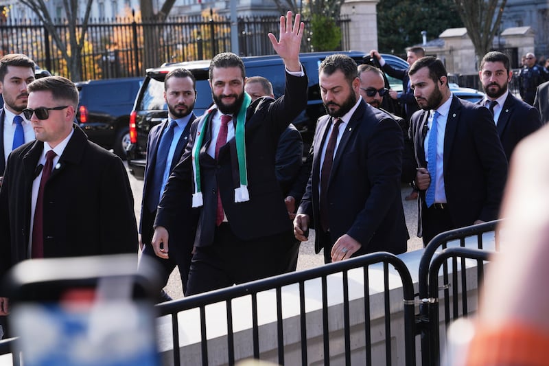Ahmed al-Sharaa waves as he greets supporters outside the White House before a meeting earlier this year. Photograph: Jacquelyn Martin/AP