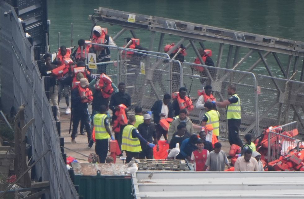 A stock image of migrants arriving in Kent