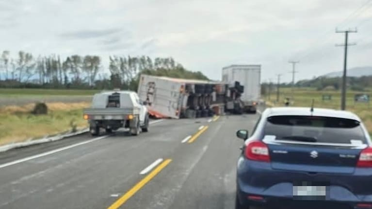 A truck rolled on State Highway 27.