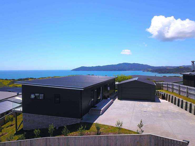 The Southams' three-bedroom home in Cable Bay, in the Far North, fetched $890,000. Photo / Supplied