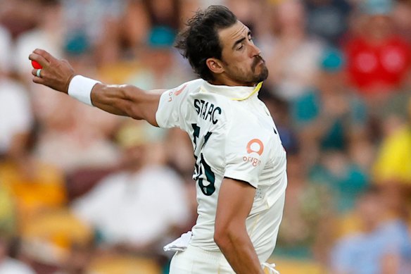 Mitchell Starc rips in.