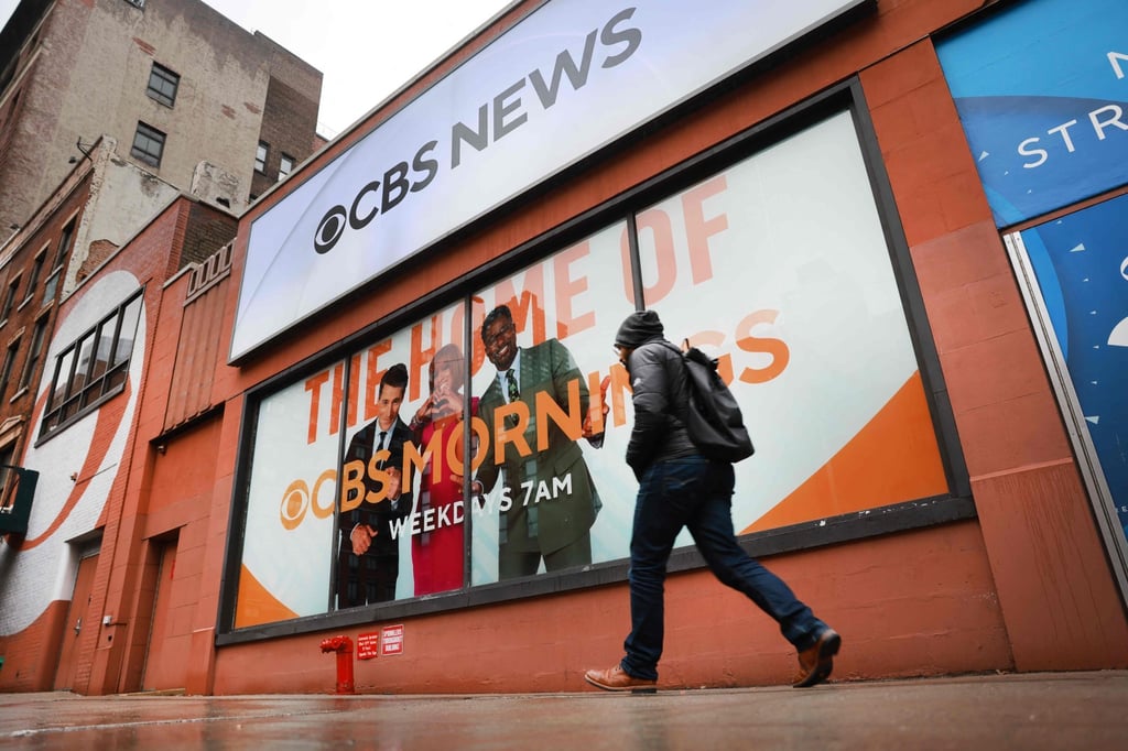 A person walks by the CBS Broadcast Centre in New York on Tuesday. Photo: AFP