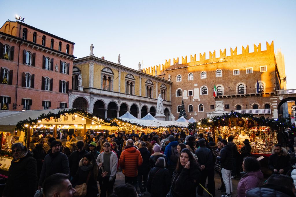 A general view of the Christmas lights, decorations, and markets is seen in Piazza dei Signori in Verona, Italy, on December 26, 2023. (Photo by Alessandro Bremec/NurPhoto via Getty Images)