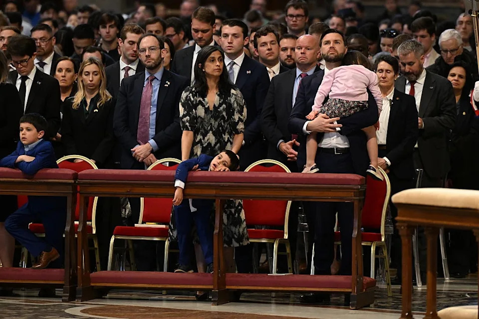 the vance family attend a solemn event in a church