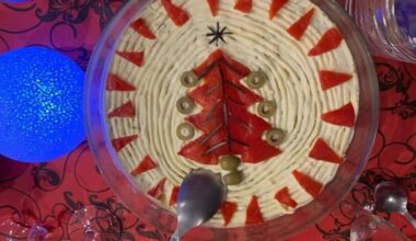 Potatoes, carrots, peas, and pickled cucumber, and the option to add beef or chicken, mixed with homemade mayonnaise, decorated festively